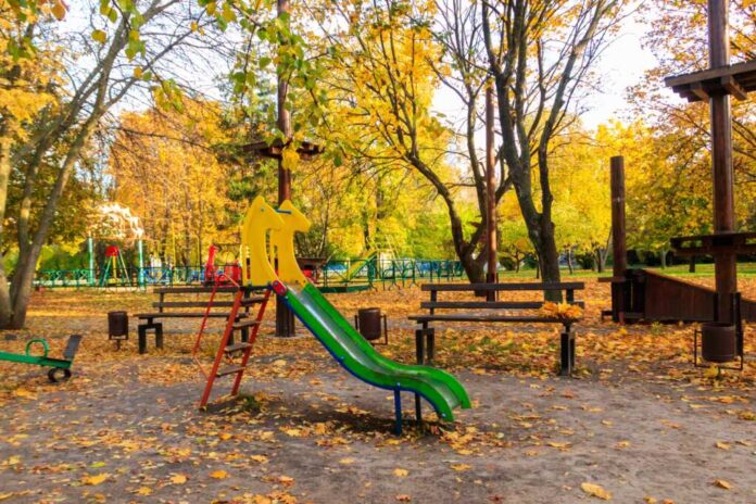 Colorful,Playground,Equipment,For,Children,In,Public,Park,At,Autumn