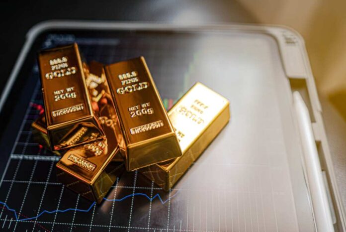 Gold,Bars,Place,On,The,Phone,That,Opens,The,Candlestick