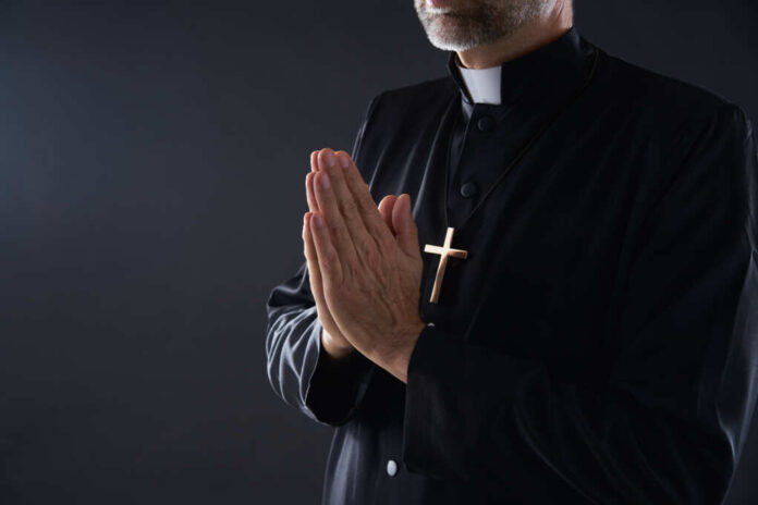 Praying,Hands,Priest,Portrait,Of,Male,Pastor
