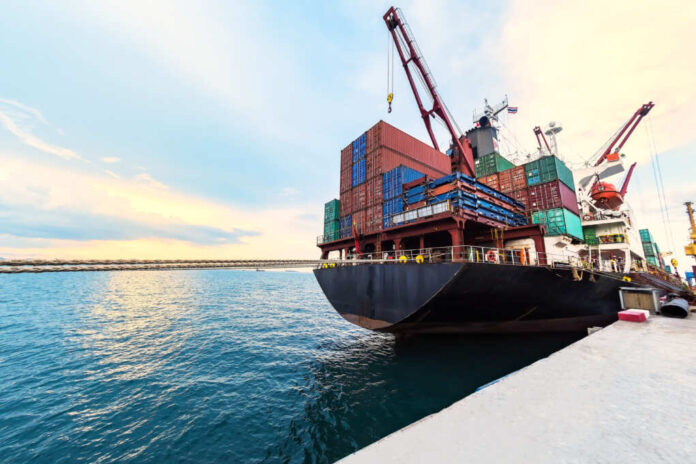 Container,Ship,Commercial,Vessel,Alongside,In,Port,For,Loading,And