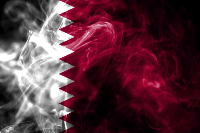 National,Flag,Of,Qatar,Made,From,Colored,Smoke,Isolated,On