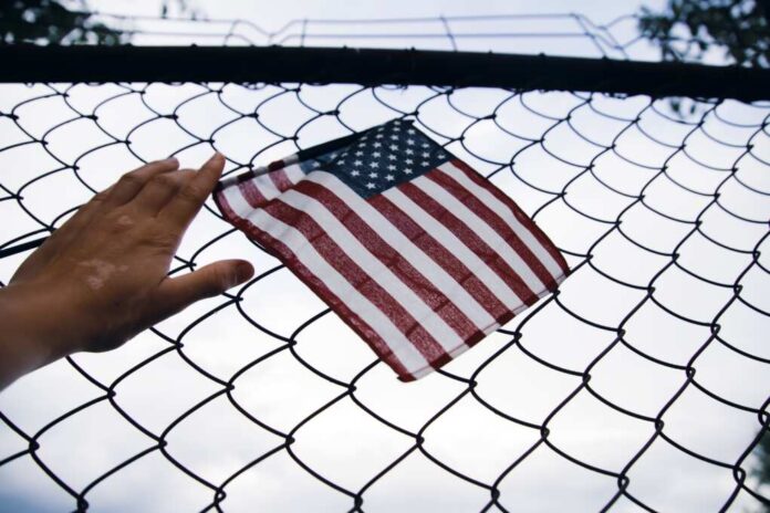 Close,Up,Of,A,American,Flag,In,Hand,Attached,To