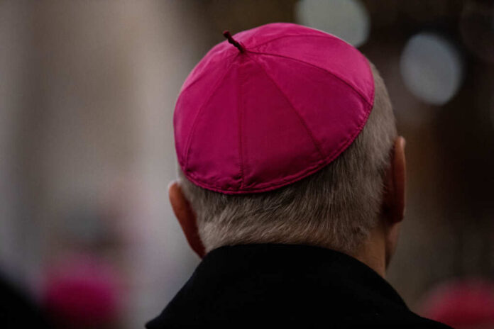 Close,-up,Of,One,Cleric,In,The,Amaranth,Zucchetto,(form-fitting