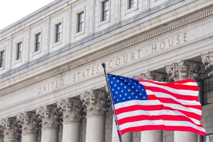 Usa,National,Flag,Waving,In,The,Wind,In,Front,Of