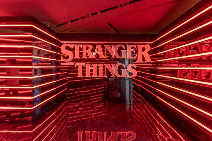 Paris,,France,-,June,27,,2022:,Red,Neon,Logo,Stranger