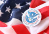 U.S. Department of Homeland Security emblem on an American flag