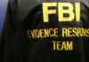 Close-up of an FBI Evidence Response Team jacket with gold lettering