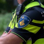 THIRD Bombing Hits Jewish School—Terrifying Pattern Emerges Close-up of a police officer's uniform with a communication device