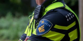 Close-up of a police officer's uniform with a communication device