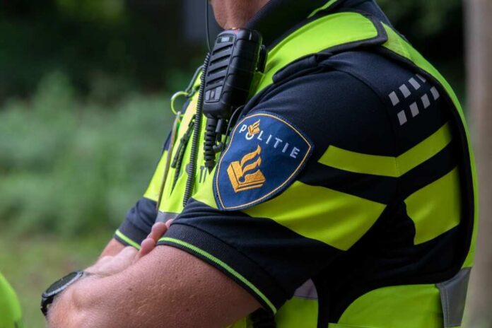 Close-up of a police officer's uniform with a communication device