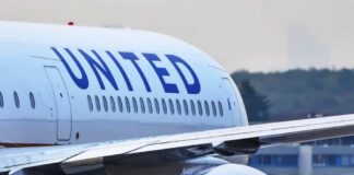 Close-up view of a United Airlines airplane wing and engine