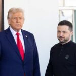Two political leaders standing together in a formal setting