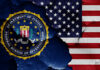 FBI emblem partially obscured by a cracked wall with an American flag background