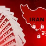 A stack of hundred dollar bills with a map of Iran and padlocks