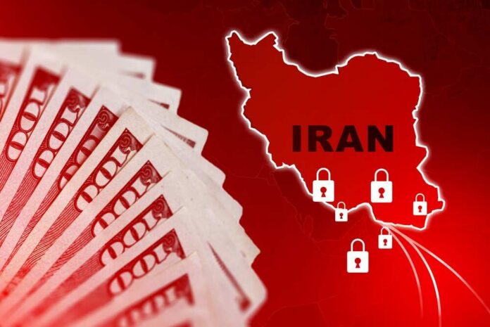 shutterstock_2763909707.jpg A stack of hundred dollar bills with a map of Iran and padlocks