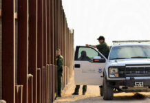 Border Fentanyl Seizures Skyrocket – Staggering Numbers! U.S. Customs and Border Protection officers near a border fence
