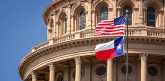 American and Texas flags flying in front of a state capitol building