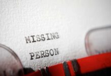 Close-up of a typewritten document with the words 'MISSING PERSON'