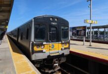 Riders Stranded: Rail Strike Halts NYC Commute Long Island Rail Road train at station platform