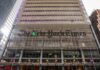 Facade of The New York Times building with large signage