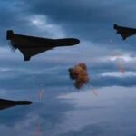 Drone Swarm Freezes Moscow — Airports Go Dark Three military drones fly through a cloudy sky amid anti-air fire