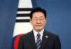 South Korea Bets Big on Trump Waving flag of South Korea against a blue sky