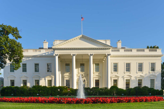The,White,House,-,Washington,Dc,,United,States The White House with a fountain and flower beds in front