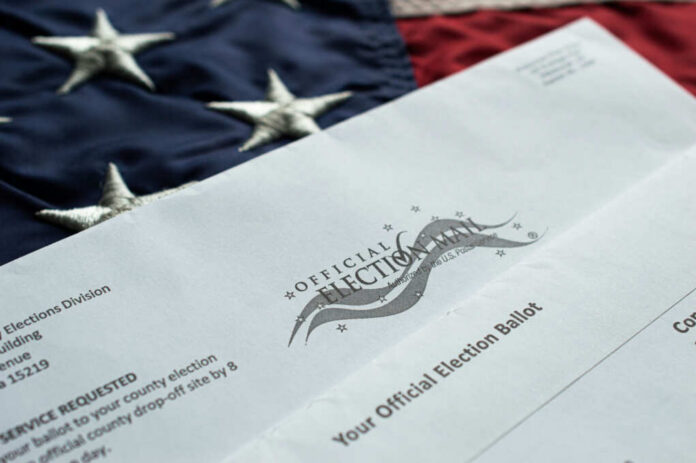 An official election ballot placed on an American flag background