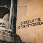 Office of the Attorney General building facade with metal sculpture