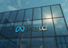 Exterior view of a modern corporate building featuring the Meta logo