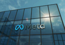 Exterior view of a modern corporate building featuring the Meta logo
