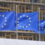 Europe’s Border Pivot Mirrors Trump Three European Union flags waving in front of a building