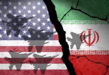 White House Rejects Explosive Iran Claims A cracked wall featuring the flags of the USA and Iran with military aircraft silhouettes