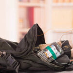 Mystery Bombing Stuns Monaco Elite A backpack containing a mobile phone and wires, suggesting a suspicious setup