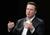 Elon Musk Challenges Human Mortality A business leader speaking during an interview, using hand gestures for emphasis