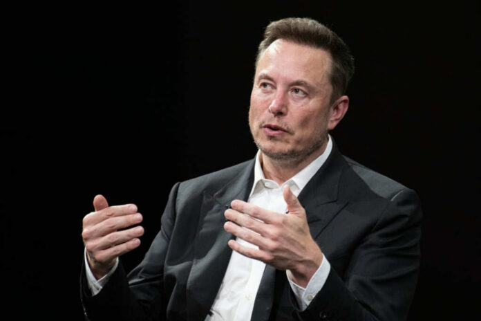 shutterstock2318800325jpg A business leader speaking during an interview, using hand gestures for emphasis
