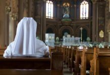 Nuns Fight New York Assisted Dying Rules Person in white habit seated in a church pew facing the altar