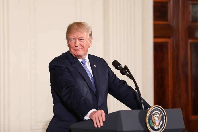 shutterstock_1082158661 man at podium with presidential seal
