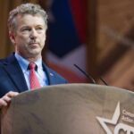 Rand Paul Releases Explosive FBI Records A man speaking at a podium during a political conference