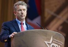 Rand Paul Releases Explosive FBI Records A man speaking at a podium during a political conference