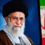Successor Missing From Historic Funeral Portrait of a political leader with a black turban and glasses