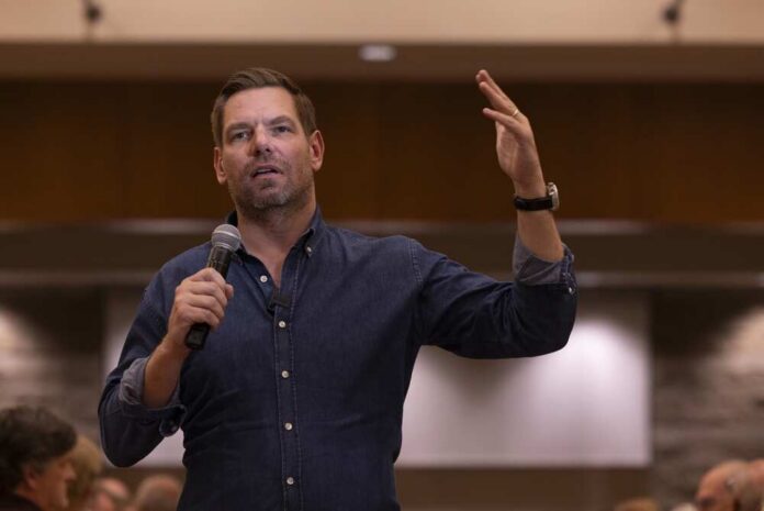 Mission,Viejo,,California,,Usa,-,June,19,,2025:,Congressman,Eric A speaker addressing an audience with a microphone in hand