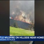 SoCal fire prompts evacuations as smoke billows over homes; video shows flames near golf course