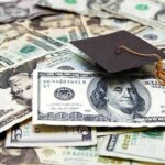 Aid For Illegals? Trump’s DOJ Draws A Line Graduation cap on a pile of US dollar bills
