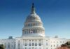 Congressman Defies Calls To Quit United States Capitol building with dome under clear blue sky