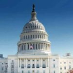 Congressman Defies Calls To Quit United States Capitol building with dome under clear blue sky