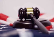 ICE Release Raises Questions After Maine Arrest Judge’s gavel on a base over an American flag