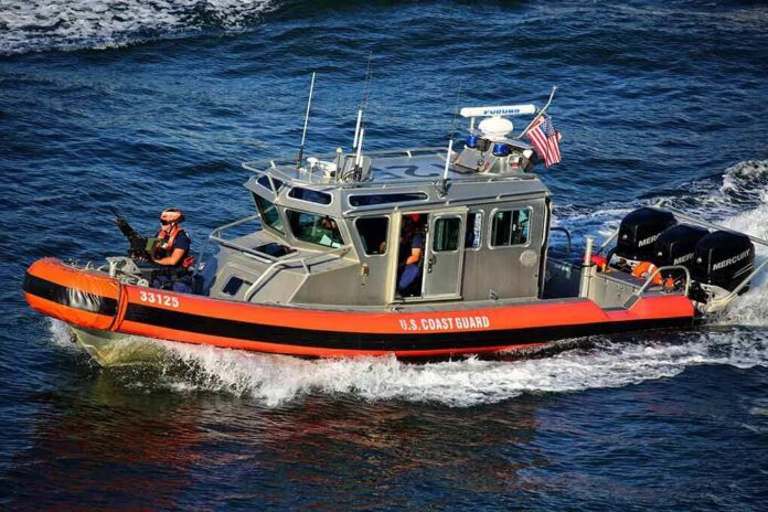 shutterstock_1174172665 U.S. Coast Guard patrol boat speeding on open water
