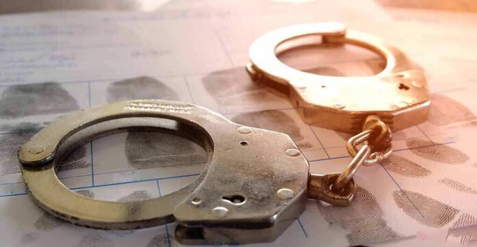 Handcuffs on a fingerprint form