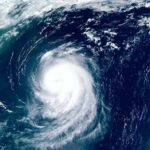 Satellite view of a powerful hurricane swirling over the ocean